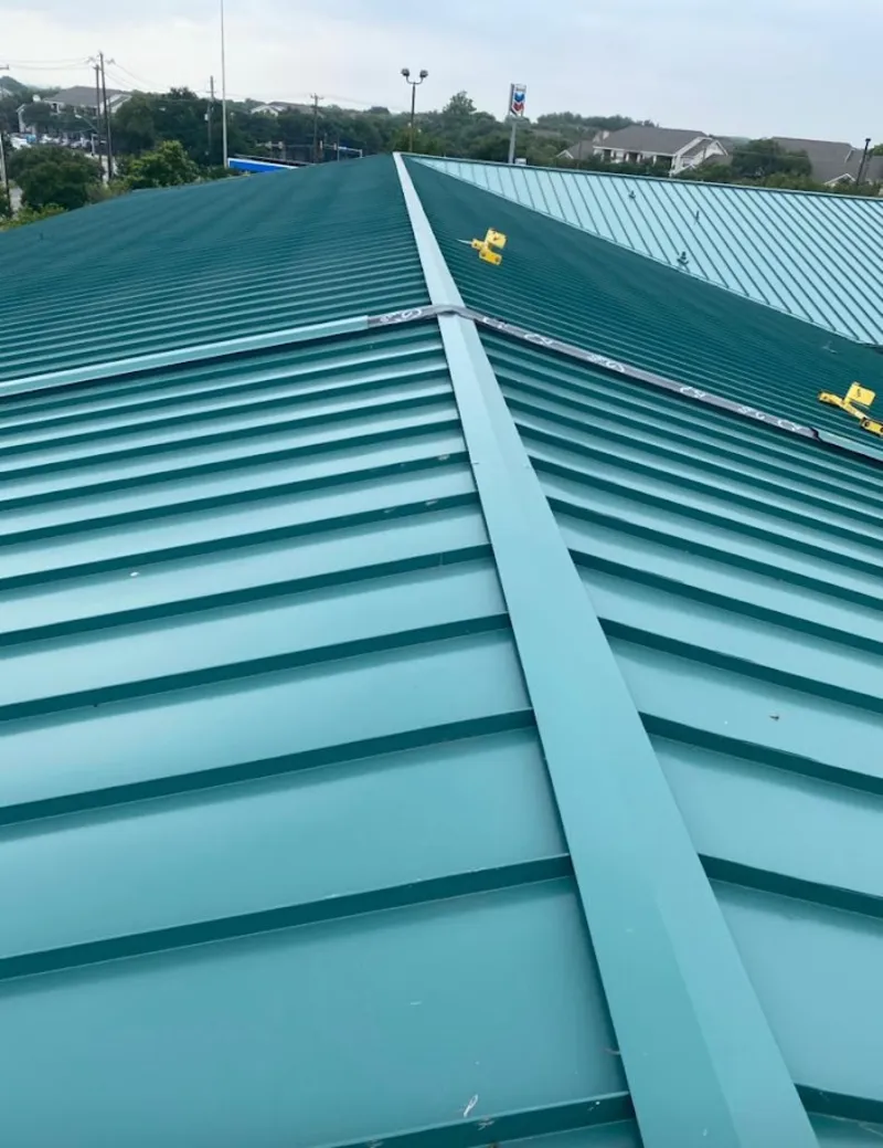 Green commercial metal roof ridge and valley for Metal Roof Repair in Floresville